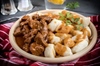 Slow-Cooked Beef Goulash with Homemade Potato Gnocchi