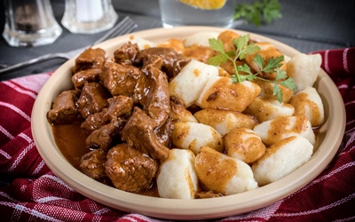 Slow-Cooked Beef Goulash with Homemade Potato Gnocchi