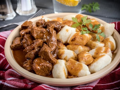 Slow-Cooked Beef Goulash with Homemade Potato Gnocchi