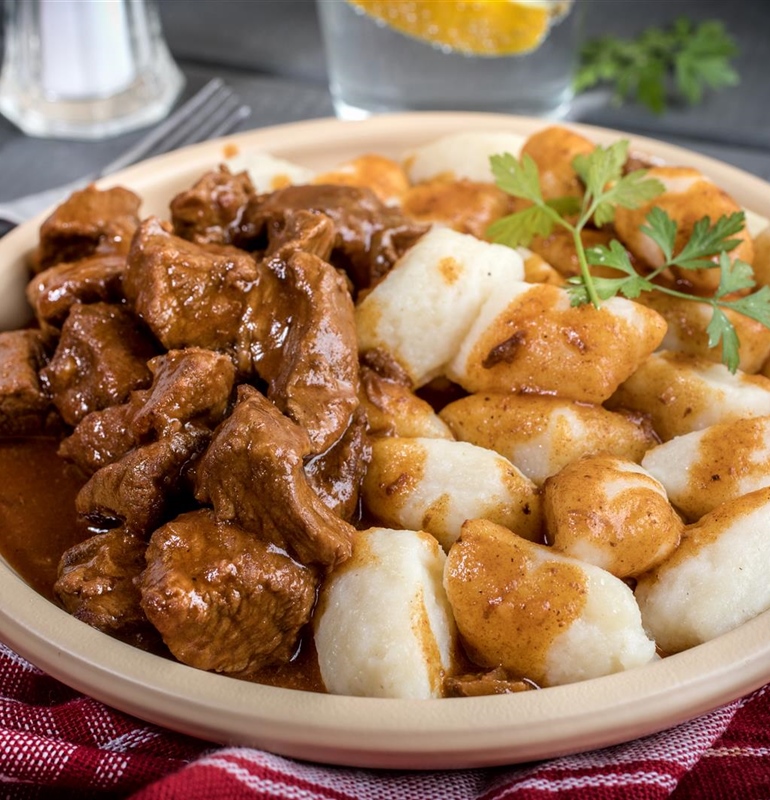 Slow-Cooked Beef Goulash with Homemade Potato Gnocchi