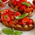 Sunlit Garden Bruschette with Juicy Tomatoes and Fresh Basil