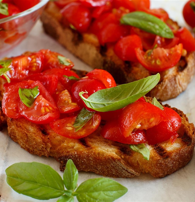 Sunlit Garden Bruschette with Juicy Tomatoes and Fresh Basil