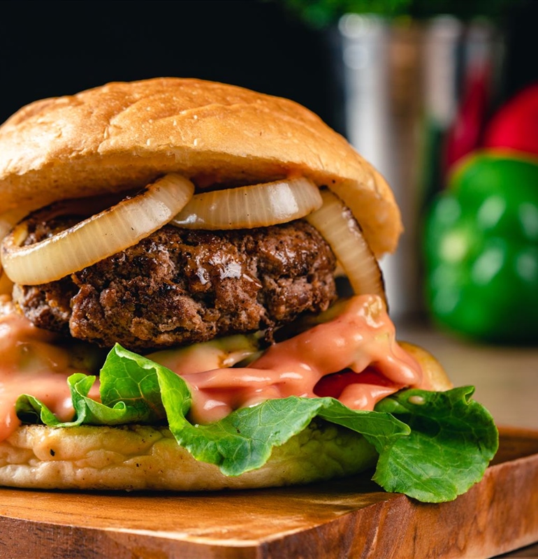 The Homestyle Burger with Freshly Baked Buns and Sweet Caramelized Onions