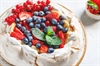 Pavlova – Elegant Meringue Dessert with Whipped Cream and Fresh Berries