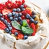 Pavlova – Elegant Meringue Dessert with Whipped Cream and Fresh Berries